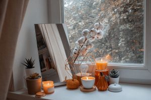 blog 5 Candle Scent For Every Room Styled By A Window – Cozy Fall Candle Display With Soy Candles.