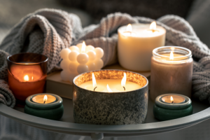 Candle Trends 2025: A Cozy And Modern Home Fragrance Setup Featuring Trending Candle Styles, Soy Wax Candles, And Elegant Décor For A Warm Ambiance.